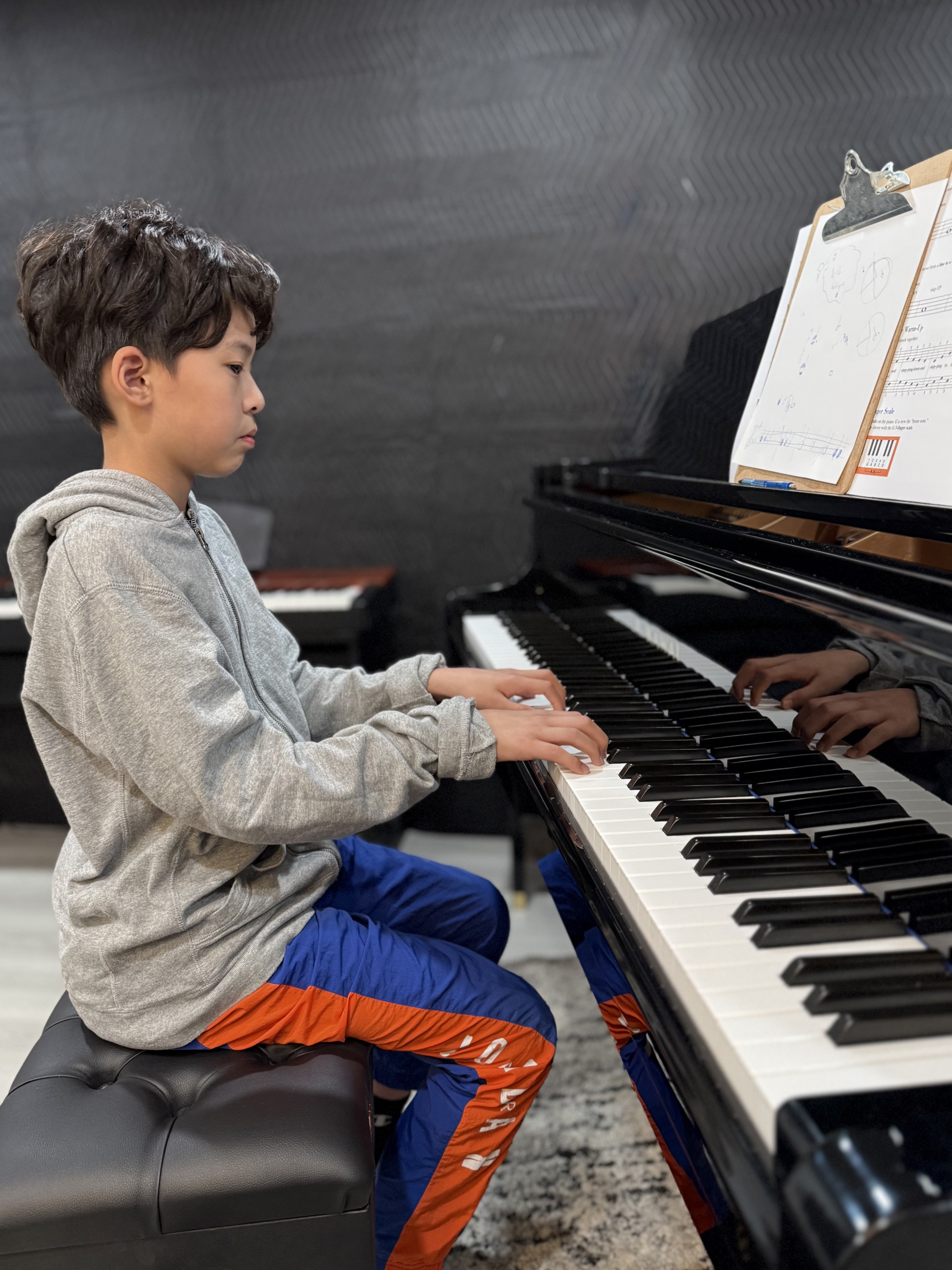 Piano student practicing at Gia Ree Piano Studio